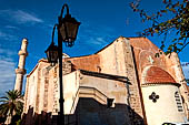 Hania - A minaret (missing its top) adorns the church of yios Niklaos in the Plata 1821.